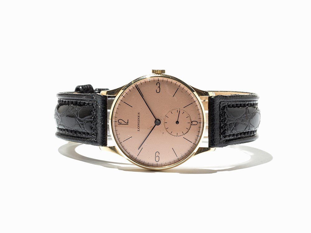 Longines Gold Vintage Wristwatch, Switzerland, C. 1950: Longines gold vintage wristwatch Switzerland, c. 1950 Manual wind movement, hour, minute, subsidiary second Copper-coloured dial, blued hands Watch case of 14K gold Black calfskin leather strap with p