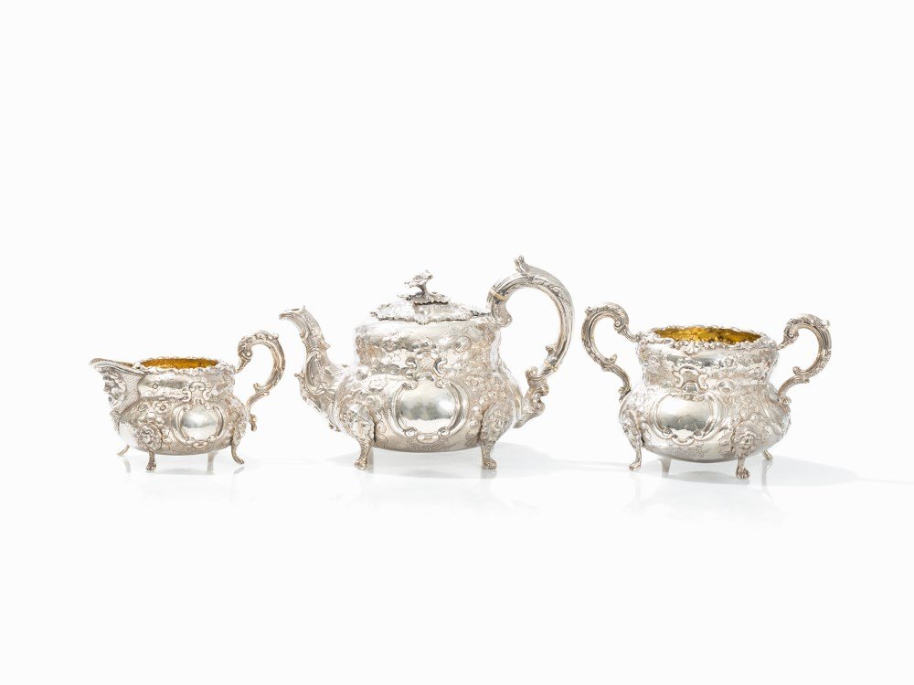 John Smyth, 3pieces Tea Set, Sterling Silver, Dublin,: Queen Victoria Sterling Silver, hallmarked, wrought and chiselled, partially gilded inside, ivory Dublin, Ireland, 1862 Hallmarked on the base with makers mark, silver standard and city marks as well