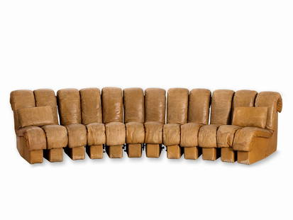 De Sede, Sofa System ‘DS-600’, 12 Modules, Switzerland,: Wooden frame, upholstered in cognac colored leather Switzerland, 1970 Design: Ueli Berger, Eleonora Peduzzi Riva, Heinz Ulrich & Klaus Vogt Format: DeSede, Klingnau 12 modules, the two outer with