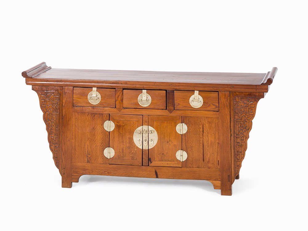 Liansanchu’ Altar Coffer with Carvings, Qing Dynasty: Hardwood, metal fittings China, Qing dynasty (1644-1911) Traditional Liansanchu cabinet with symbolic carvings Table top with upward everted flange Front with three rectangular drawers above a pair of