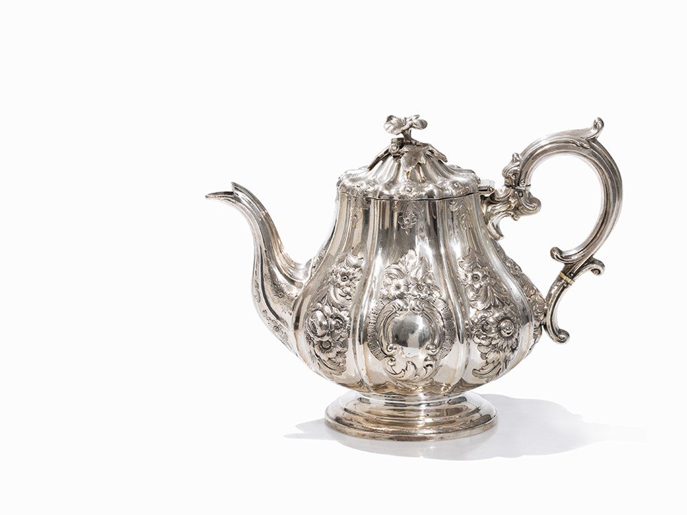 A Victorian Silver Teapot by Robert W. Smith, Dublin,: Sterling silver, cast, embossed, chased, engraved and punched Ireland, 1855 Robert W. Smith (reg. 1784 and 1834) - Irish silversmith Maker’s mark, city mark, guarantee mark, duty mark and date lette
