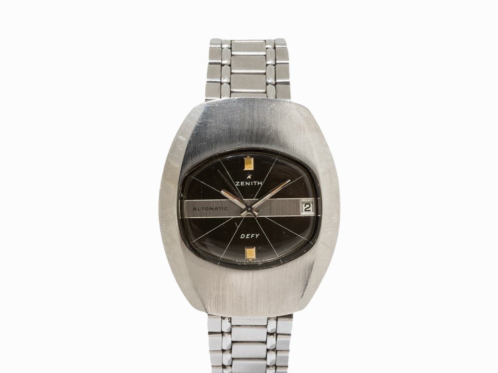 Zenith Defy Wristwatch, Switzerland, C. 1970: Zenith Defy wristwatch Switzerland c. 1970 Automatic movement, hour, minute, second, date Grey-black dial, silver luminescent Baton hands Watch case, original strap and folding clasp of stainless stee