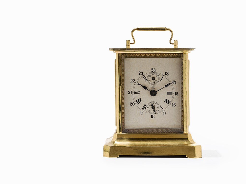 Junghans Table Clock with Alarm, c. 1920: Junghans table clock with alarm Germany, c. 1920 Key wind-up, hour, minute, subsidiary second, alarm Beige dial, blued hands Watch case of gold plated brass Key enclosed Case size: 13.5 x 10 x 15 cm T