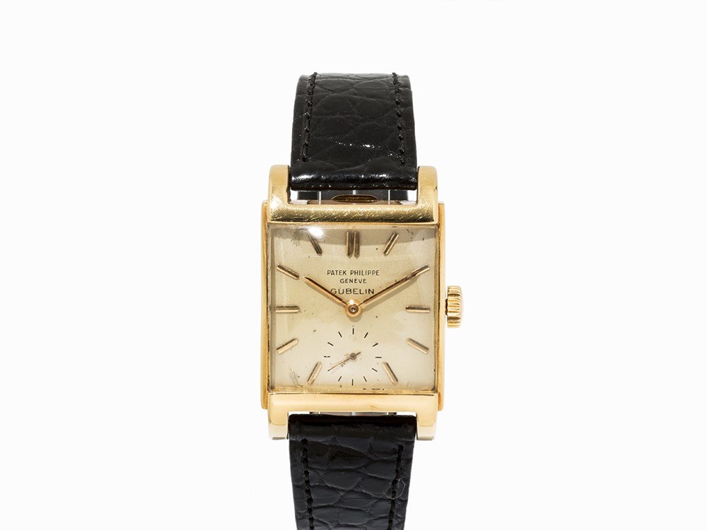 Patek Philippe “Bombe” Wristwatch Gübelin, Ref. 2476 J,: Patek Philippe “Bombe” wristwatch, Gübelin signature, ref. 2476 J Switzerland, 1951 Manual wind- rectangular movement, calibre 9’’’90; hour, minute, second Silver dial, blued hands Watch ca