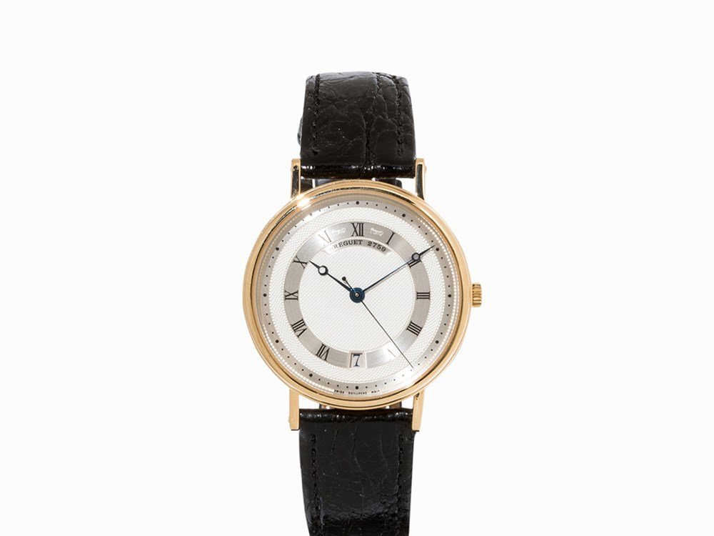 Breguet Classique, Ref. 5930, Switzerland, c. 2005: Breguet Classique, ref. 5930 Switzerland, c. 2005 Automatic movement, calibre 517/1, adj. 5; 28 jewels hour, minute, second, date Silver dial, blued Breguet hands Watch case of 18K gold Black leather