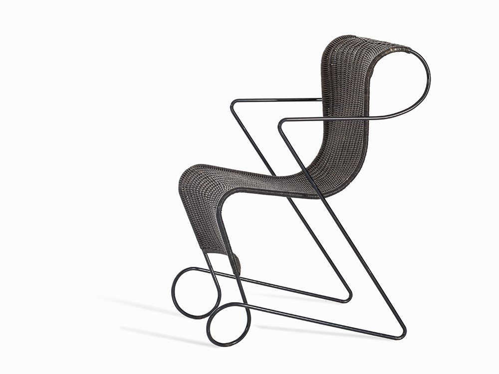 Ron Arad, Armchair 'Zago', England, 1990: Tubular metal, wicker, black lacquered England, 1990 Designer: Ron Arad (born 1951) – British Designer and architect Manufacturer: Driade, Italy height: 86 cm, 46 x 60 cm Very good condition The arm