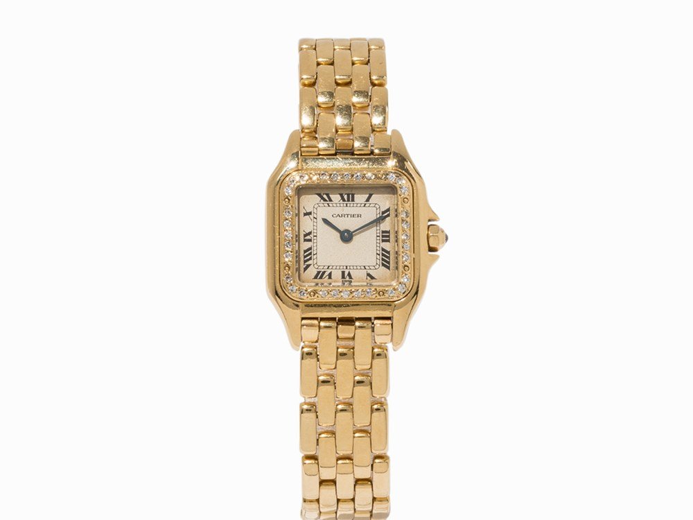 Cartier Gold and Diamond Lady’s Watch, c. 1990: Cartier gold and diamond lady’s watch Switzerland, c. 1990 Quartz movement, hour, minute Silver dial, blued hands Watch case, original strap and butterfly clasp of 18K gold Watch case edge set with