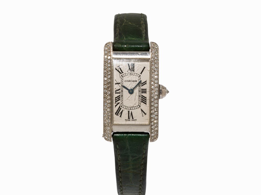 Cartier White Gold and Diamonds Lady’s Watch, Ref.: Cartier white gold and diamonds lady’s watch, ref. 2489 Switzerland, c. 2001 Quartz movement, hour, minute Silver dial, blued hands Watch case and original pin buckle of 18K white gold Watch case se