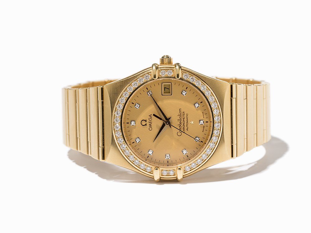 Omega Constellation Chronometer, Switzerland, Around: Omega Constellation chronometer wristwatch, ref. 1107150 Switzerland, around 2003 Automatic movement, calibre 112; hour, minute, second, date Gold dial, gold hands Watch case, strap and folding clasp