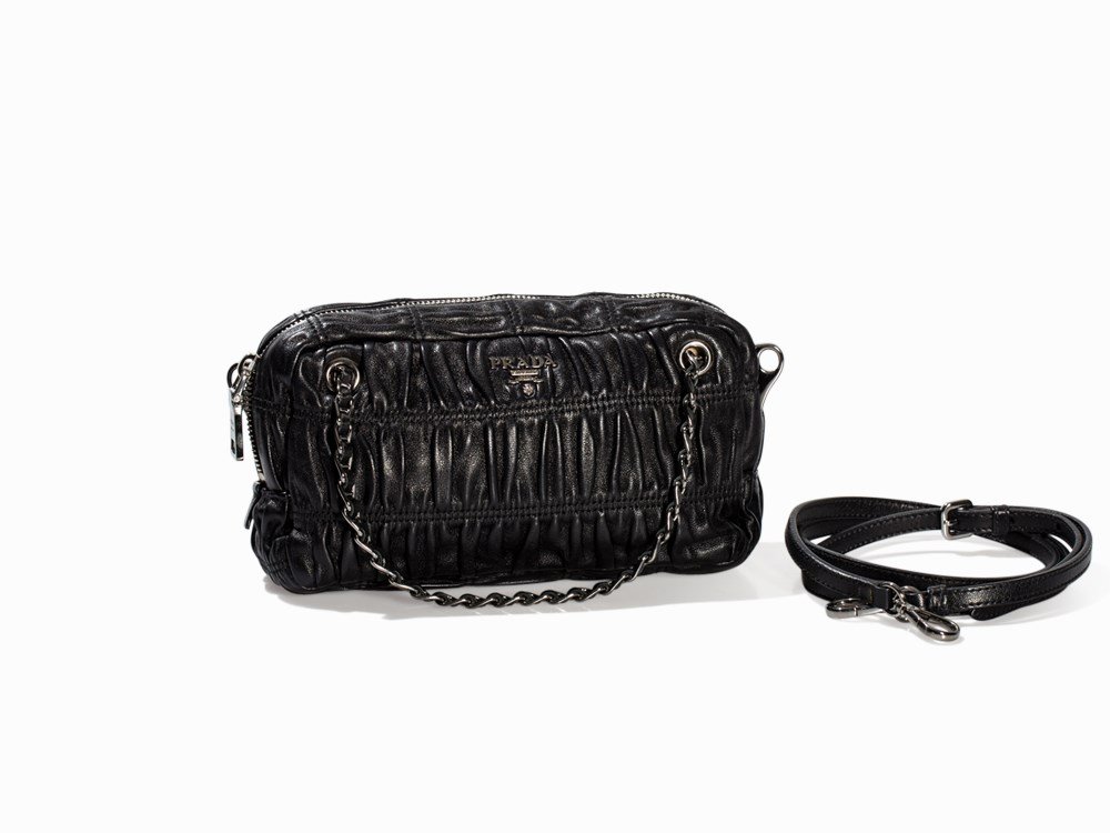 Prada, Black Leather Gaufre Shoulder Bag, Milan, c.: Black nappa. metal Milan, c. 2011 Prada - Italian luxury label, founded in 1913 by Mario and Martino Prada With exterior and inner manufacturer logo ‘Prada Milano’ Rushed shoulder bag with removab