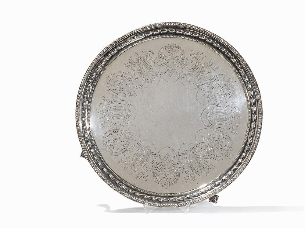 A Victorian Silver Salver, Robert Harper, London, 1863: Sterling silver, cast, wrought and chased England, 1863 Robert Harper (reg. 1853-1880) - Silversmith in London Hallmarked with the maker's mark of Robert Harper, the silver standard mark, the London c
