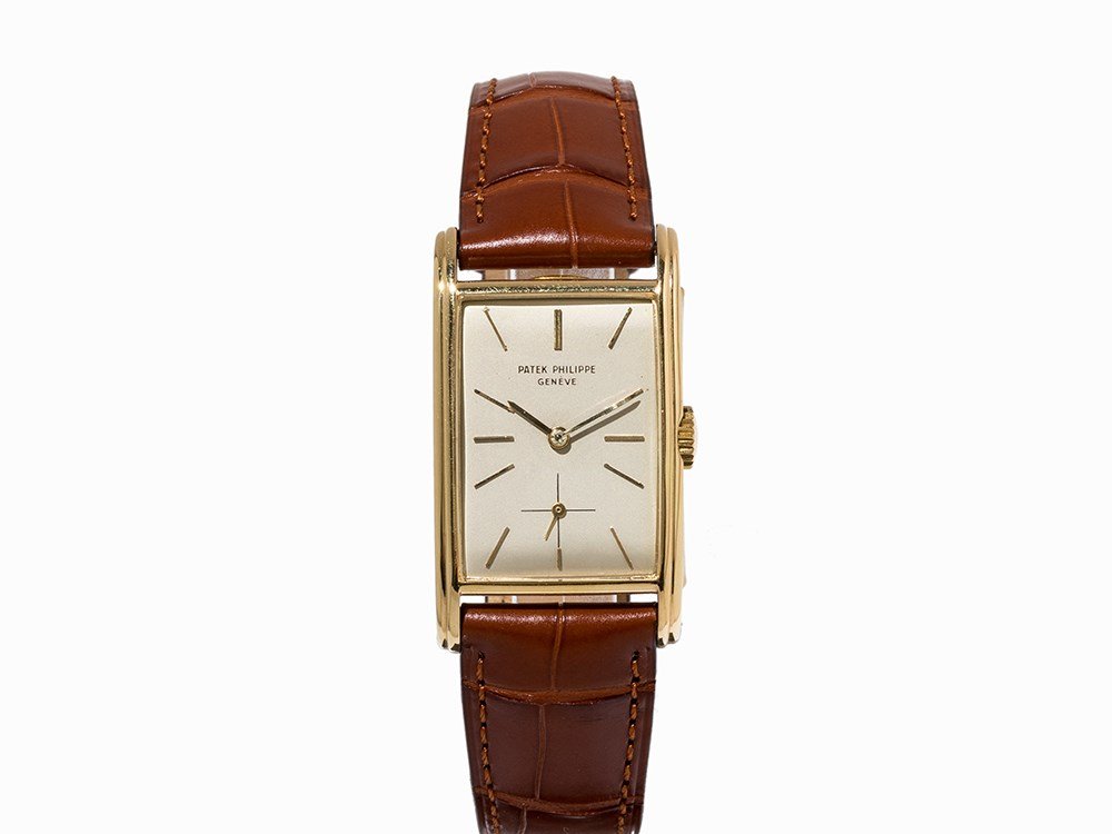 Patek Philippe Rectangular, Switzerland, c. 1938: Patek Philippe Rectangular wristwatch Switzerland, c. 1938 Manual wind- rectangular movement; hour, minute, subsidiary second Silver dial, gold hands Watch case of 18K gold Brown alligator leather str