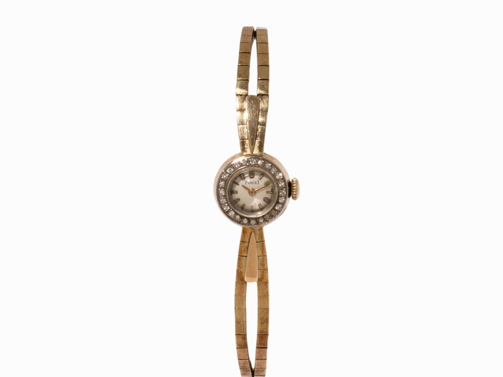 Piaget Gold Lady’s Watch, Switzerland, c. 1965: Piaget gold lady’s watch Switzerland, c. 1965 Manual wind movement, calibre 6P1; 17 jewels, hour, minute Silver dial, gold hands Watch case, strap and folding clasp of 14K gold Watch case edge set w