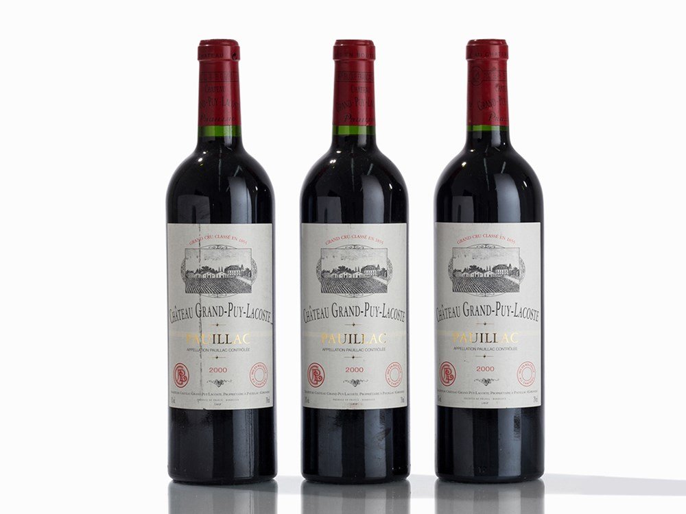 3 Bottles 2000 Château Grand-Puy-Lacoste, Pauillac: Three bottles of Château Grand-Puy-Lacoste 2000 vintage Pauillac, Bordeaux/France Original filling quantity: 0.75 l Fill level: into neck Robert Parker (2010): 94/100 Wine Spectator (2016): 92/100 Re