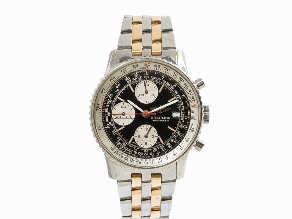 Breitling Navitimer Chronograph, c. 2000: Breitling Navitimer chronograph Switzerland, c. 2000 Automatic movement; hour, minute, second, date, chronograph Black dial, white hands Watch case, original strap and folding clasp made of stainless