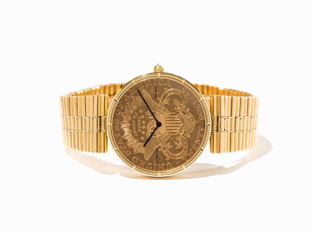 Corum 20 Dollar Coin Watch, Switzerland, C. 2000: Corum 20 $ coin watch Switzerland, c. 2000 Automatic movement, adj. 3; 35 jewels, hour, minute Gold 20 Dollar coin as dial displaying the eagle and motto “In God We Trust”, blued hands Backside of