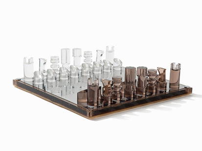 Michel Dumas, Chessboard with 32 Figures, France, c.: Transparent and toned plexiglass, metal, polished and brushed Design: Michel Dumas – French designer On the plexiglass sliding plate with sticker ‘michel dumas créations’ Dimensions of the ches