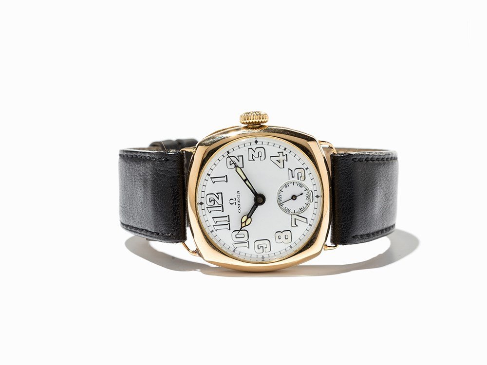 Omega, Early Wristwatch, Switzerland, C. 1917: Omega, Early wristwatch Switzerland, c. 1917 Manual wind movement, hour, minute, subsidiary second White porcelain dial, blued hands Watch case of 18K gold Black calfskin leather strap with original,