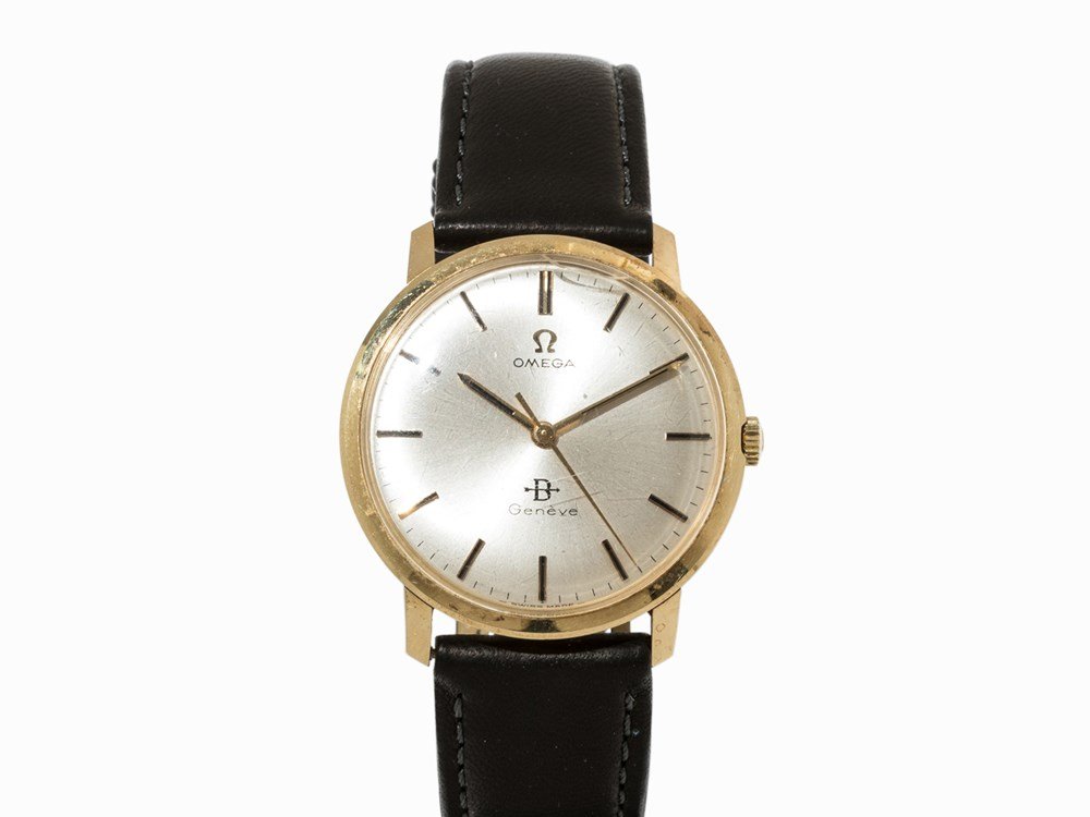 Omega Genève wrist watch, c. 1969: Omega Genève wrist watch Switzerland, c. 1969 Manual wind movement, calibre 601, adj. 2; 17 Jewels, hour, minute, second Silver dial, gold hands Watch case of 14K gold Black leather strap with pin bu