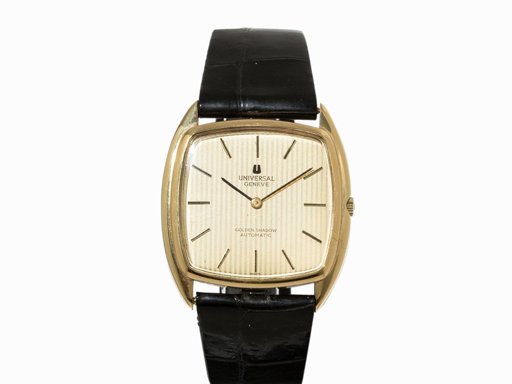 Universal Geneve Golden Shadow, c. 1970: Universal Geneve Golden Shadow Switzerland, c. 1970 Automatic movement with micro rotor, calibre 2-66, adj. 2; 26 Jewels, hour, minute Gold dial, black hands Watch case of 18 K Gold Original, black le