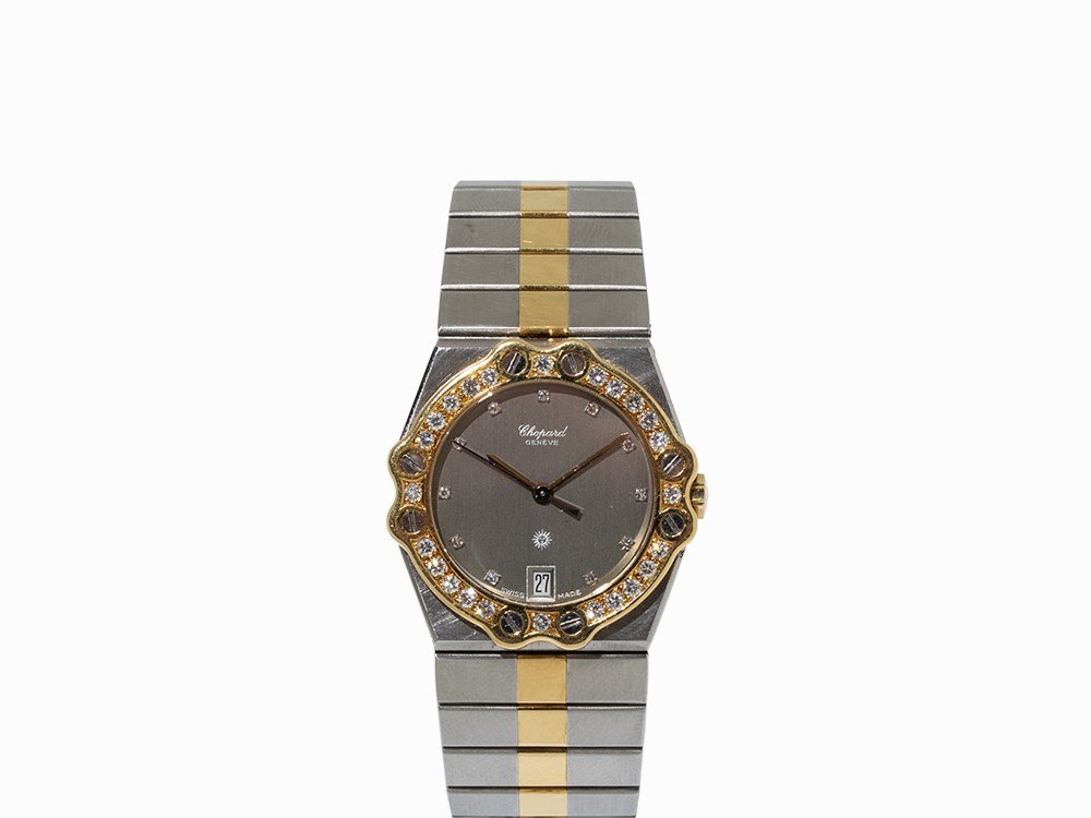 Chopard St. Moritz, Switzerland, c. 2000: Chopard St. Moritz, ref. 8023 Switzerland, c. 2000 Movement: quartz, hour, minute, second, date Dial: signed silver dial, gold hands, silver second hand, 11 diamond indexes, clean, condition 1 Case: s