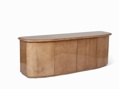 Oscar Torlasco, Sideboard ‘Almond’, Aldo Tura, Italy,: Wood, light brown parchment ‘Almond’, high-gloss Design: Oscar Torlasco – Italian designer and architect Producer: Aldo Tura – Italian furniture maker, 1990s Model: 2624 Dimensions: 81 x 230 x