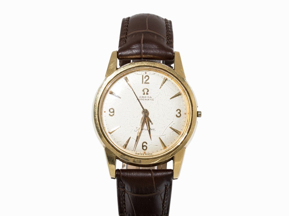 Omega Seamaster Automatic, c. 1960: Omega Seamaster Automatic Switzerland, c. 1960 Automatic movement, calibre 591; 20 jewels, hour, minute, second Silver dial, golden hands Watch case of stainless steel Brown crocodil leather strap wit