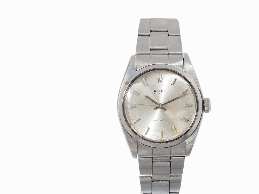 Rolex Oyster Precision, Ref. 6425, c. 1971: Rolex Oyster Precision, Ref. 6425 Switzerland, c. 1971 Manual wind movement, calibre 1225, 17 jewels, hour, minute, second, Silver dial, silver hands Watch case, original strap and folding clasp of st