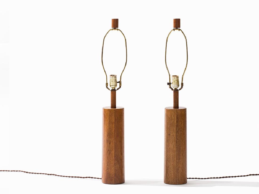 Gordon and Jane Martz, Pair of Table Lamps, USA, 1950s: Teak Veedersburg, Indiana, USA Design: Gordon and Jane Martz, US American Designers 1950s for Marshall Studios Solid cylindrical lamp feet made from teakwood Visible lamp mountings with a small wooden