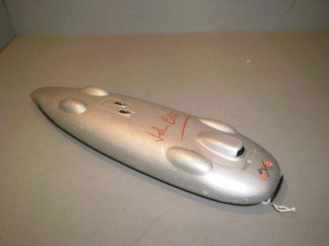 A clockwork tinplate model of John Cobbs land spee: A clockwork tinplate model of John Cobbs land speed record car.