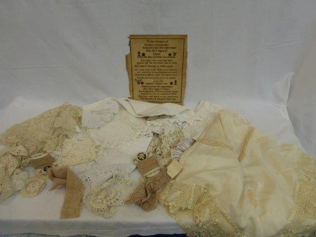 A 19th Century sampler in memory of William Vickers: A 19th Century sampler in memory of William Vickers 28/9/1856 aged 19 and Reuben Vickers 19/9/1857 aged 21; also an assortment of lace.