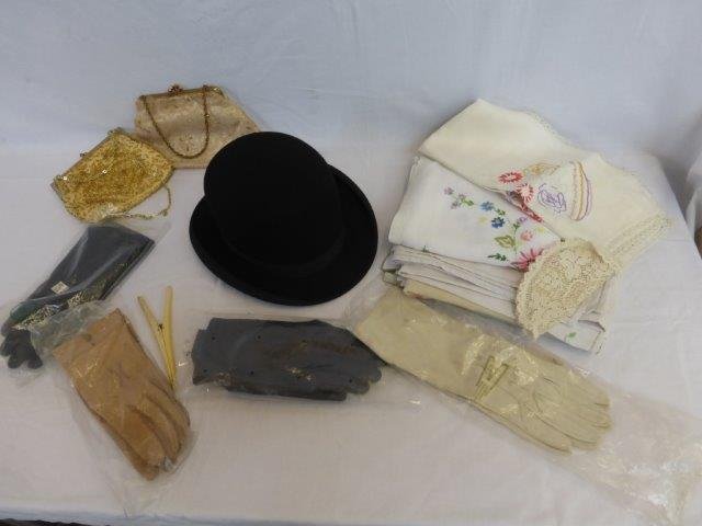 'The Dulcis Make' bowler hat, a selection of driving: 'The Dulcis Make' bowler hat, a selection of driving gloves, various evening bags, gloves and table linen etc.
