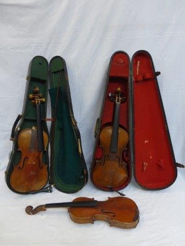 A cased violin for restoration with bow, the violin: A cased violin for restoration with bow, the violin having label - 'Stontgretch Gachie'; a rosewood cased violin and one other.