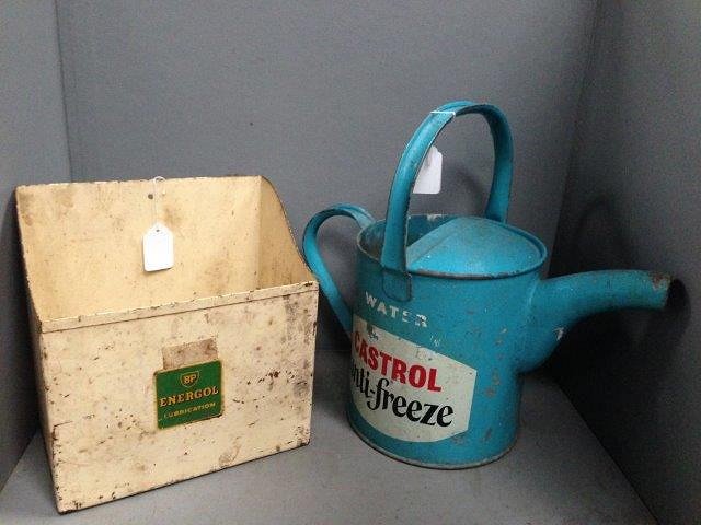 A Castrol anti-freeze watering can and a BP Energol: A Castrol anti-freeze watering can and a BP Energol metal rack.