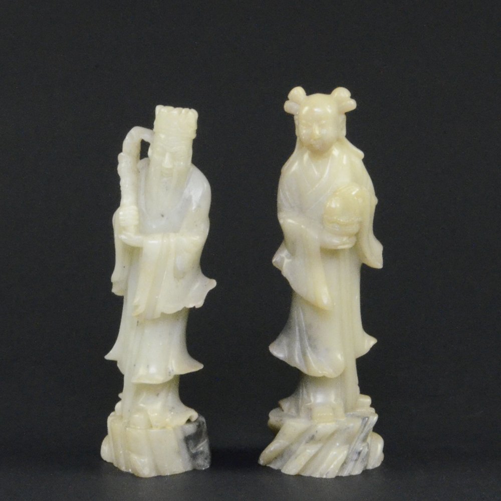 TWO CARVED SOAPSTONE FIGURES