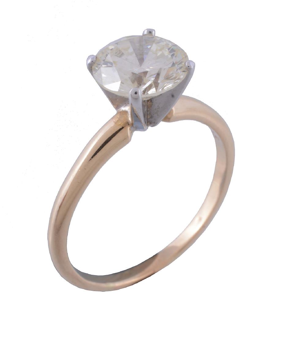 A diamond single stone ring, the brilliant cut diamond, (1 of 3)
