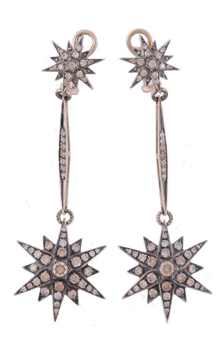 A pair of brown diamond Genesis earrings by H (1 of 2)