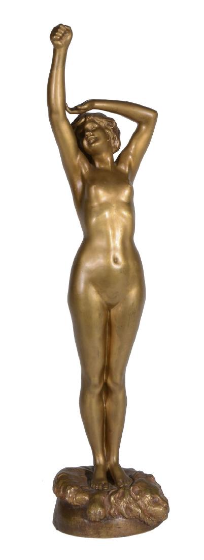 Calendi , Italian or French, a gilt bronze model of a: Calendi (?), Italian or French, a gilt bronze model of a girl, late 19th / early 20th century, portrayed nude and standing, her left hand raised to shield her eyes, her smiling visage looking up to he