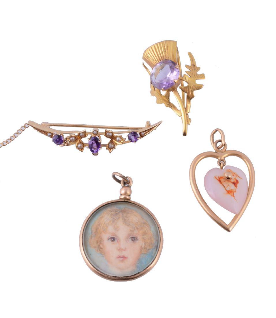 An amethyst thistle brooch, the circular cut amethyst (1 of 1)