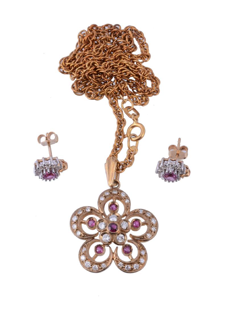 A 9 carat gold ruby and diamond flower head pendant (1 of 1)