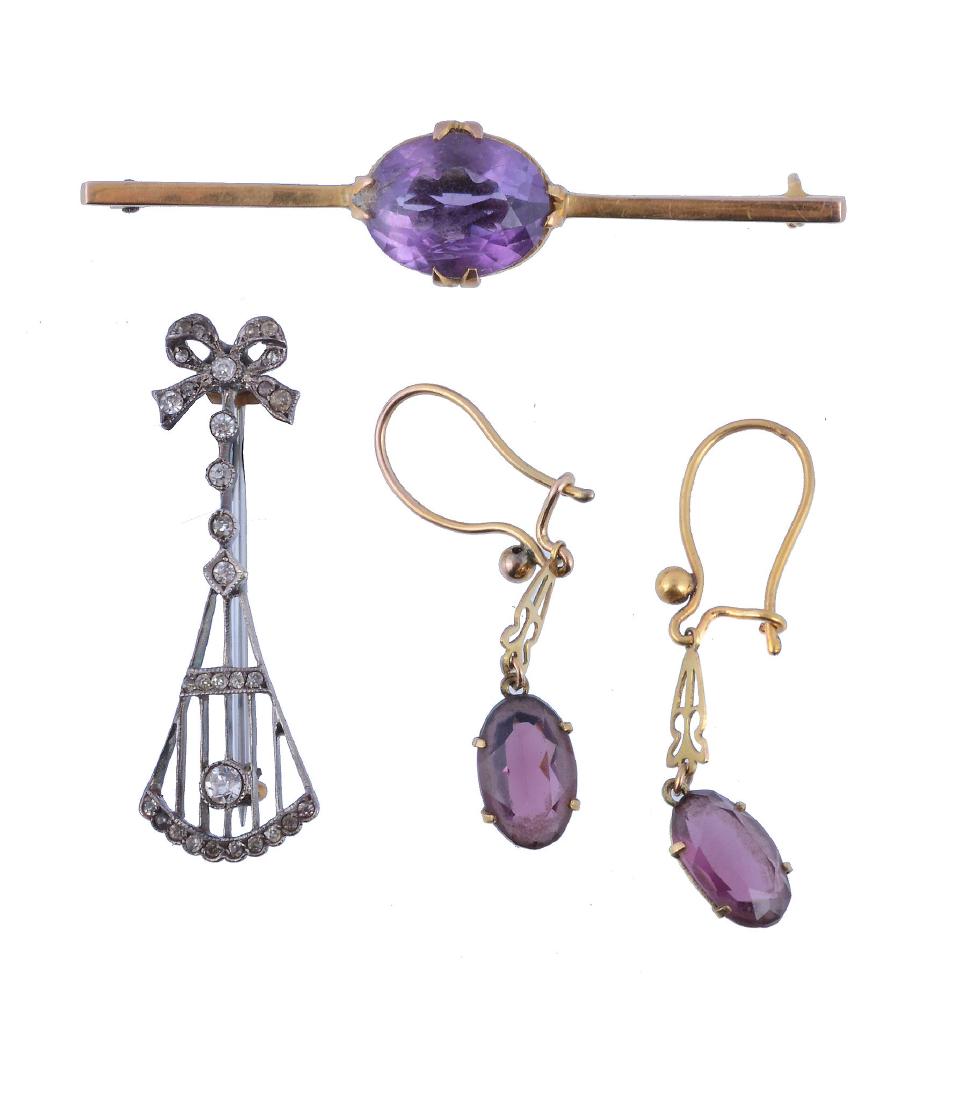 An amethyst brooch, the oval cut amethyst in a claw (1 of 1)