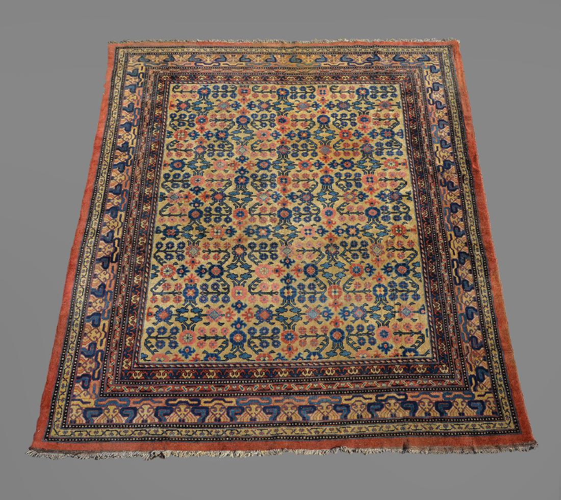 A large Khotan rug, circa 1900, East Turkestan, (1 of 3)