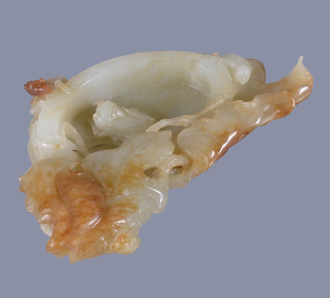 A Chinese pale celadon and russet jade 'leaf' dish (1 of 5)