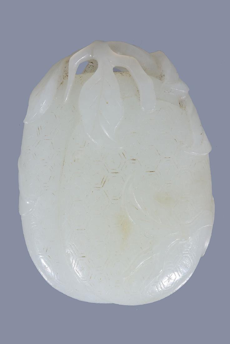 A good Chinese white jade caring of two 'melons' (1 of 2)