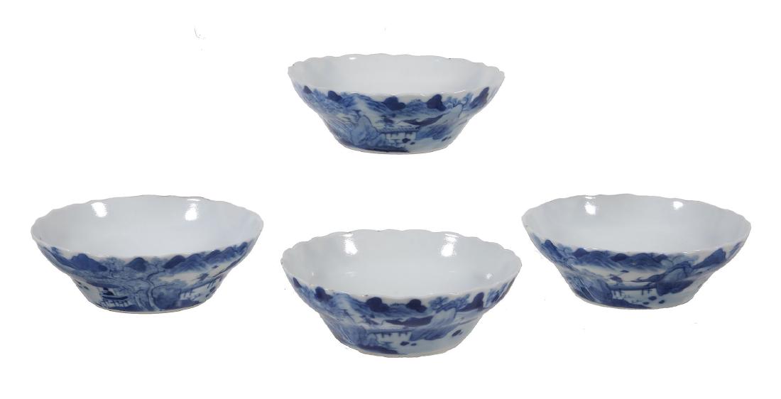 A set of four blue and white bowls , painted with: A set of four blue and white bowls , painted with figures in landscapes, with a man fishing, a figure in a pavilion and a man with a buffalo, 12.2cm diameter (4) Provenance: John Wallace Ord Davidson,