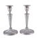 A pair of silver candlesticks by Roberts & Dore Ltd