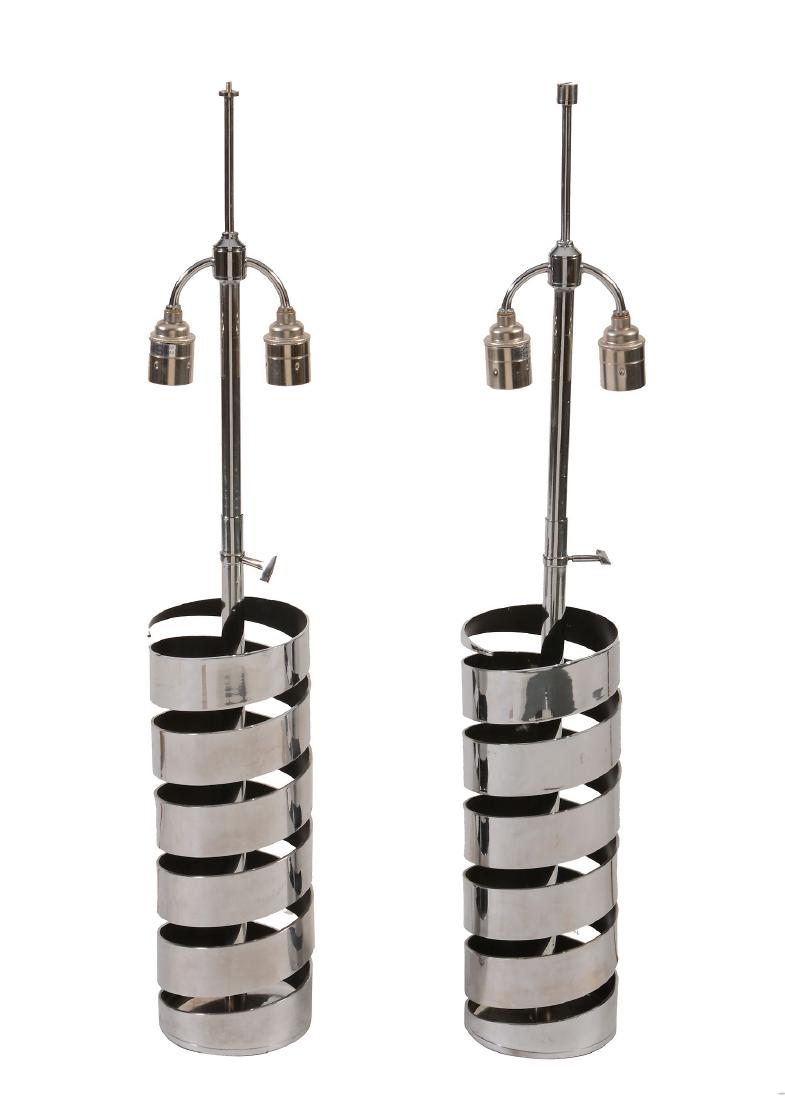 δ A pair of Chrome 'spiral' lamps by Jacques: δ A pair of Chrome 'spiral' lamps by Jacques Charpentier , 1970s, of cylindrical form, fitted for electricity, 57cm high, 13cm diameter IMPORTANT: This lot is sold subject to Artists Resale Right