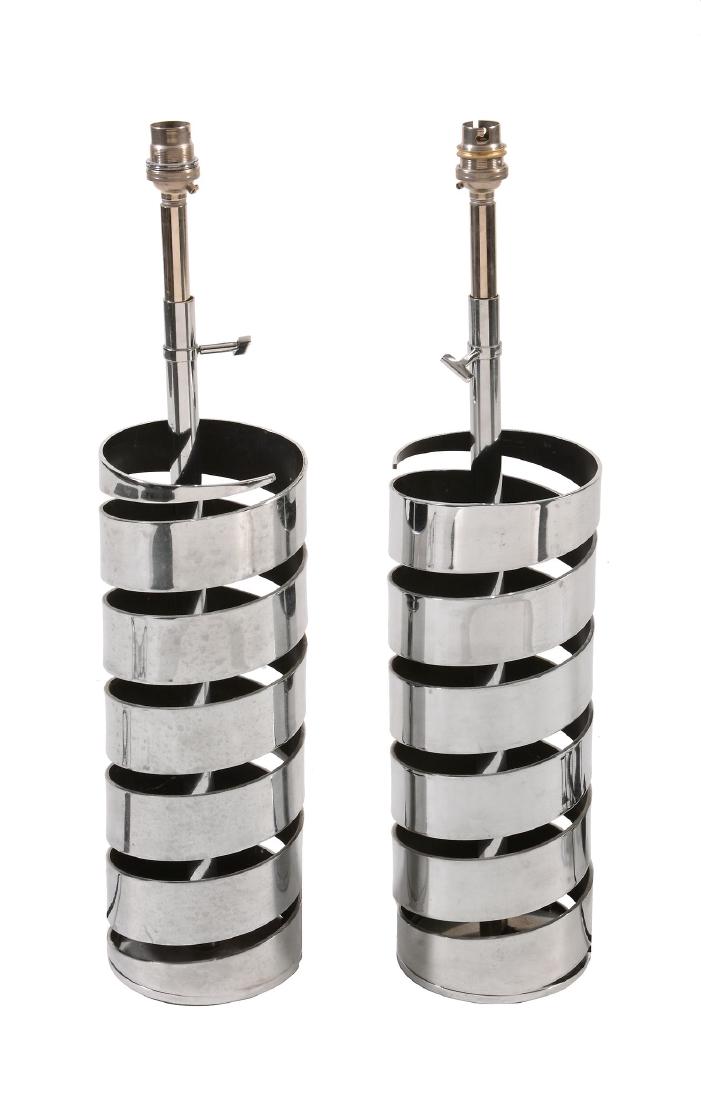 δ A pair of Chrome 'spiral' lamps by Jacques: δ A pair of Chrome 'spiral' lamps by Jacques Charpentier , 1970s, of cylindrical form, with raised twin double light fitments, fitted for electricity, 81cm high, 13cm diameter IMPORTANT: This lot