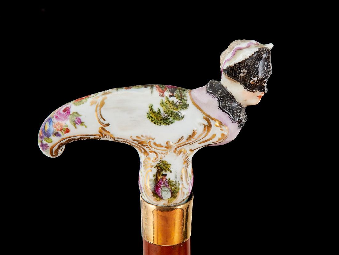 A Dresden porcelain and yellow-metal malacca cane, late (1 of 1)