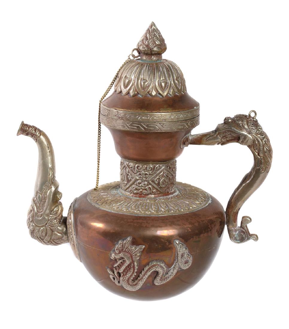 A Tibetan silver metal and copper ewer, 20th century, (1 of 4)